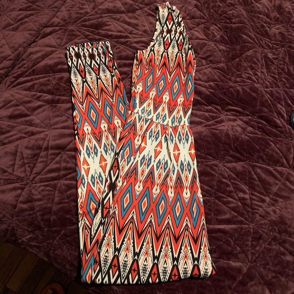 Cute multi color jumpsuit. NWOT